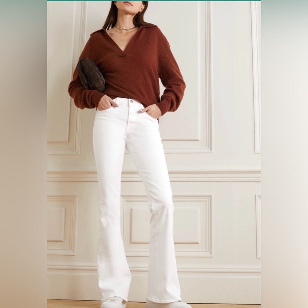 Frame white Lee High Rise Flare jeans in a size 29.